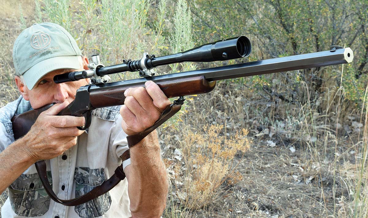 Wayne aims his Winchester 1885 in 25 Krag. Its thick, octagonal, 28-inch barrel hangs well.
